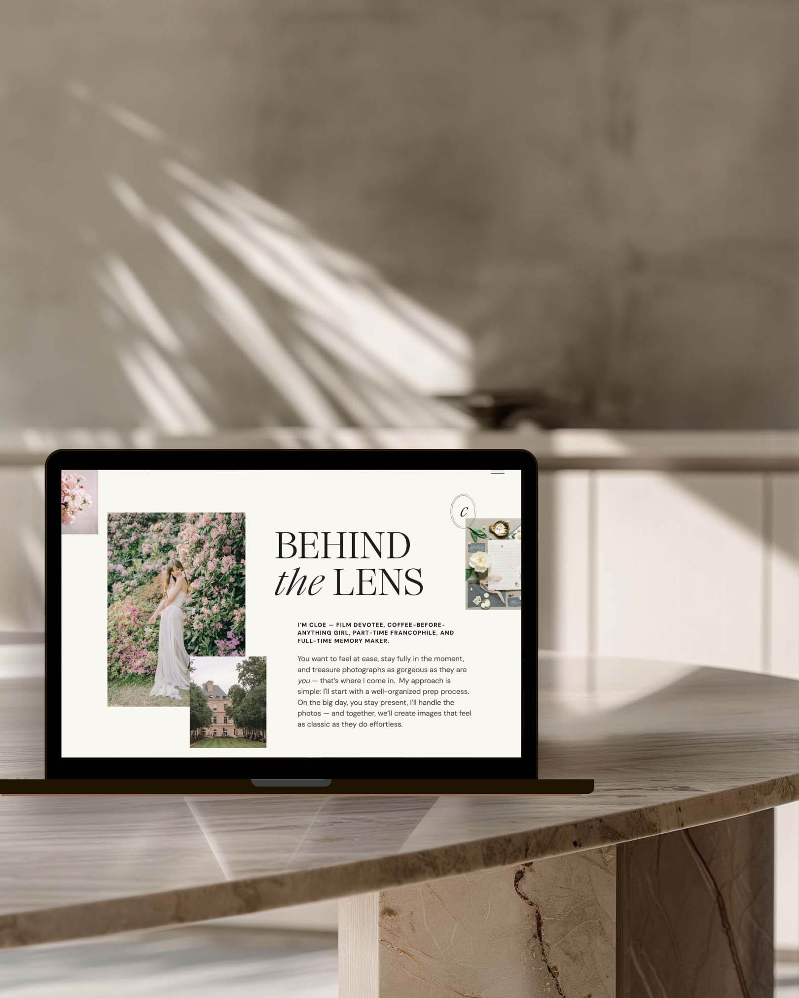 A vertical image of a computer with a photographer about page with editorial photography.